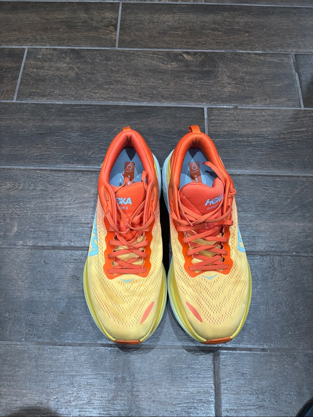 Hoka Men's Athletic Shoes Yellow with Orange and Blue Accents